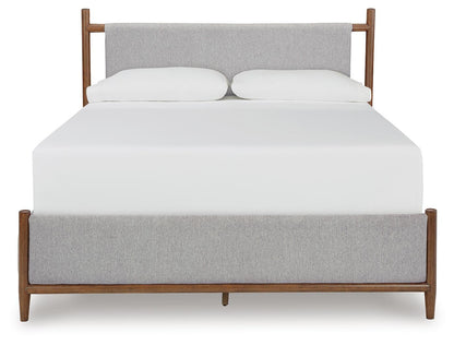Lyncott California King Upholstered Bed with Mirrored Dresser