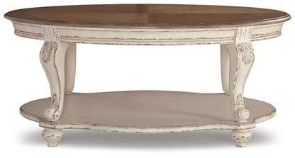 Realyn Oval Cocktail Table